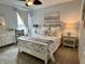 Cozy bedroom with a comfortable bed, elegant furnishings, and natural light from the window at 3691 Talmine Ln, Bargersville, IN 46106