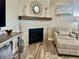 A close-up of a fireplace with decorative elements, showcasing modern design in the living space at 3691 Talmine Ln, Bargersville, IN 46106