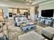 A living room featuring a view of the kitchen, an open-concept layout, and modern decor at 3691 Talmine Ln, Bargersville, IN 46106