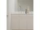 Bright bathroom featuring dual vanities with white cabinetry and countertops with decorative accents at 3882 Andean Ct, Bargersville, IN 46106