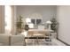 Stylish home office with modern desk, comfortable chair, sleek decor, and natural light from a large window at 3882 Andean Ct, Bargersville, IN 46106