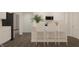 Modern kitchen featuring white cabinets, stainless steel appliances, and a center island with seating, great for entertaining at 3882 Andean Ct, Bargersville, IN 46106