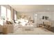 Bright and airy living room featuring neutral decor, comfortable seating, and abundant natural light at 3882 Andean Ct, Bargersville, IN 46106