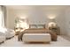 This primary bedroom showcases soft natural light, neutral color palette, comfortable furnishings, and patterned rug at 3882 Andean Ct, Bargersville, IN 46106