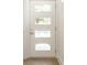 Modern entry door with glass blocks at 39 N Walcott St, Indianapolis, IN 46201