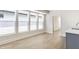 Living room with large windows providing plenty of natural light at 39 N Walcott St, Indianapolis, IN 46201