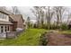 Lush green backyard with trees providing privacy and shade at 4037 Oakleaf Dr, Zionsville, IN 46077