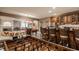 Finished basement with a pool table, bar seating, and foosball at 4037 Oakleaf Dr, Zionsville, IN 46077