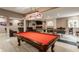 Finished basement with a pool table, ping pong, and theater seating at 4037 Oakleaf Dr, Zionsville, IN 46077