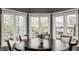 Dining area featuring a large round table, chair seating and bright, natural light at 4037 Oakleaf Dr, Zionsville, IN 46077