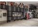 Large garage features ample storage cabinets, work bench area and pegboard organizer at 4037 Oakleaf Dr, Zionsville, IN 46077