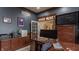 Inviting home office featuring custom cabinets, a work desk, and convenient access to adjacent rooms at 4037 Oakleaf Dr, Zionsville, IN 46077