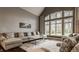 Inviting living room features an expansive sectional sofa and natural light at 4037 Oakleaf Dr, Zionsville, IN 46077