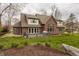 Beautiful brick home with a large deck and a well-maintained yard at 4037 Oakleaf Dr, Zionsville, IN 46077