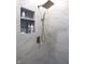 Modern shower design with a rainfall shower head, hand-held sprayer and tiled shelving niche at 4037 Oakleaf Dr, Zionsville, IN 46077