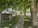 Neighborhood street view showcasing the home's location near sidewalks and mature trees at 404 Pearl St, Pendleton, IN 46064