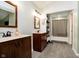 Bathroom with double vanity sinks and a shower/tub combination at 410 Wood Hollow Ct, Westfield, IN 46074