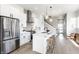 Bright, modern kitchen with stainless steel appliances, a large island, and an open concept design at 43 N Walcott St, Indianapolis, IN 46201