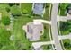 An aerial view of an expansive backyard with wooden deck, mature landscaping and a lush lawn at 4368 W Eagle Trce, New Palestine, IN 46163