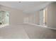 Spacious basement with neutral carpet and doorways, ready for your personal touch at 4368 W Eagle Trce, New Palestine, IN 46163