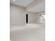 Large finished basement area with neutral carpet and recessed lighting, awaiting customization at 4368 W Eagle Trce, New Palestine, IN 46163
