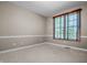 Bright bedroom featuring neutral tones and a window with wood blinds, creating a calm and inviting space at 4368 W Eagle Trce, New Palestine, IN 46163