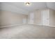 This bedroom features neutral walls and carpet at 4368 W Eagle Trce, New Palestine, IN 46163