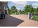 Expansive wooden deck with railing, offering outdoor living space and views of the surrounding yard at 4368 W Eagle Trce, New Palestine, IN 46163