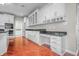 Bright kitchen with modern white cabinetry, granite countertops, and stainless appliances at 4368 W Eagle Trce, New Palestine, IN 46163
