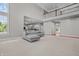 Open floor plan living room with lofted ceilings, lots of light, and view to kitchen at 4368 W Eagle Trce, New Palestine, IN 46163