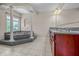 Luxurious main bathroom with a jacuzzi tub, double sinks, and elegant columns for spa-like comfort at 4368 W Eagle Trce, New Palestine, IN 46163