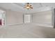 Large main bedroom with tray ceiling, ceiling fan and ample space for relaxation and rest at 4368 W Eagle Trce, New Palestine, IN 46163