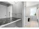 Stylish bathroom with black marble countertop and modern fixtures at 4809 Allisonville Rd, Indianapolis, IN 46205