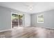 Spacious bedroom with sliding glass doors leading to the outdoor patio at 4809 Allisonville Rd, Indianapolis, IN 46205