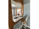 Cozy dining area with seating, adjacent to the kitchen at 4809 Allisonville Rd, Indianapolis, IN 46205