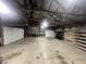 Spacious garage with high ceilings, featuring ample storage and workspace potential at 5725 W 200 N, Lebanon, IN 46052