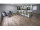 Open-concept kitchen and dining area with modern finishes and stainless appliances at 5725 W 200 N, Lebanon, IN 46052