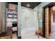 Bright bathroom featuring a tub with white subway tile and open storage shelves at 584 S 10Th St, Noblesville, IN 46060