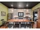 Farmhouse kitchen boasts stainless steel appliances, subway tile backsplash, and eat-in island at 584 S 10Th St, Noblesville, IN 46060
