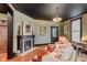 Comfortable living room with a fireplace, plush seating, and hardwood floors at 584 S 10Th St, Noblesville, IN 46060