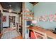 Bright office space with rustic desk, open shelving, and natural light, perfect for a creative and productive workspace at 584 S 10Th St, Noblesville, IN 46060