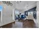 A welcoming foyer leads to a dining area and a living room with stylish decor and natural light at 608 Fisher Creek Dr, Indianapolis, IN 46239
