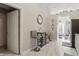 Kitchen area with barstool seating and an open entrance to another room at 608 Fisher Creek Dr, Indianapolis, IN 46239
