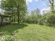 A well manicured back yard, perfect for outdoor activities and entertaining at 6091 Mt Moriah Rd, Nineveh, IN 46164