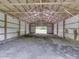 Large barn interior with dirt floor, metal walls, and ample space at 6091 Mt Moriah Rd, Nineveh, IN 46164