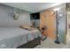 Comfortable bedroom featuring wall mounted tv, bed, and closet at 6091 Mt Moriah Rd, Nineveh, IN 46164