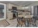 Eat-in kitchen featuring stainless steel appliances, wood countertops, and rustic wood backsplash at 6091 Mt Moriah Rd, Nineveh, IN 46164