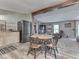 Eat-in kitchen featuring stainless steel appliances, wood countertops, and view to the living room at 6091 Mt Moriah Rd, Nineveh, IN 46164