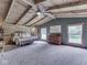 Spacious main bedroom with vaulted wood ceiling, neutral carpet, and lots of natural light at 6091 Mt Moriah Rd, Nineveh, IN 46164