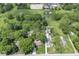 Aerial view of property highlighting the home and pool with mature landscaping at 6110 Orinoco Ave, Indianapolis, IN 46227
